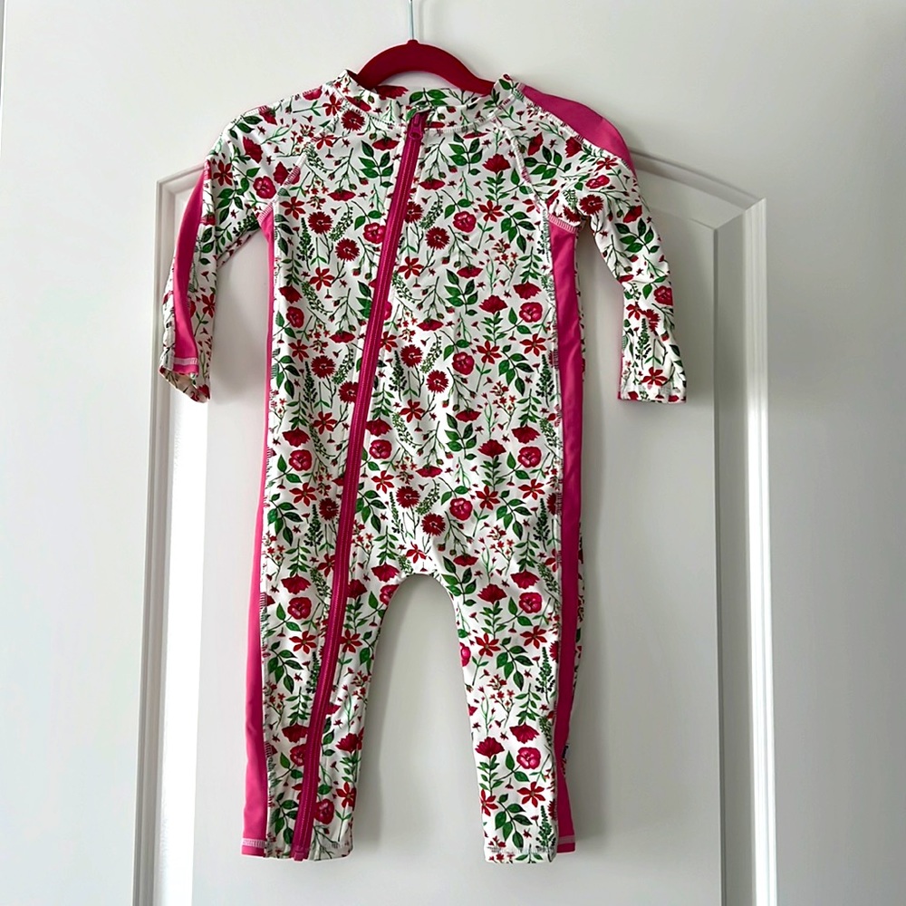 Floral SwimZip UPF 50+ one piece swimwear.